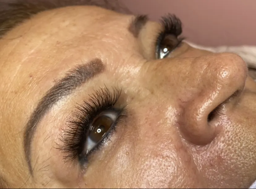 Clean brow shape and lashes after a visit